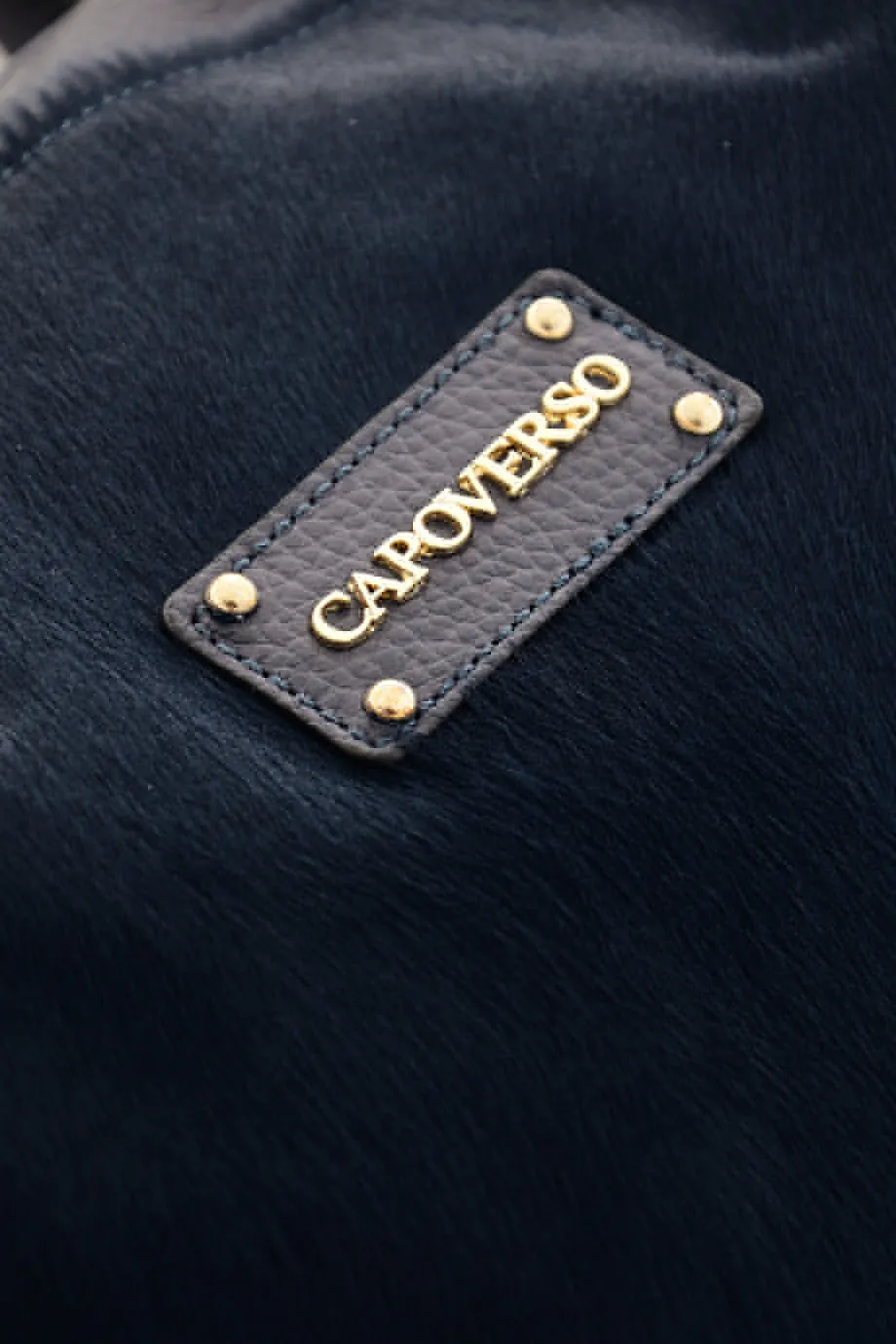 CAPOVERSO CAVALLINO Blue Pony Hair Leather Grab